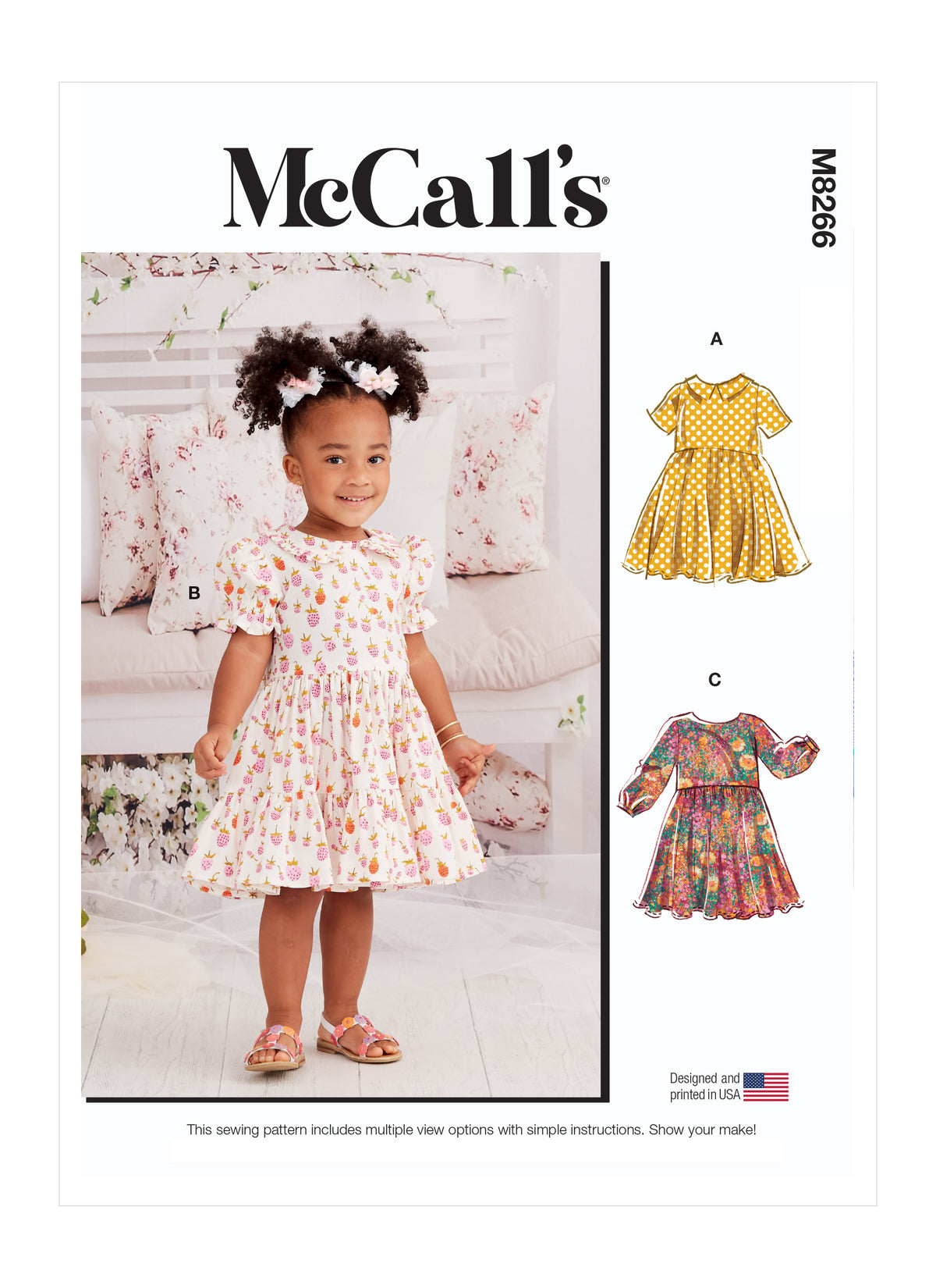 McCall's M8266 sewing pattern envelope showing fit-and-flare toddler dresses