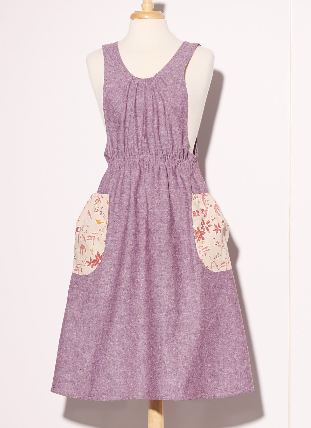 McCall's M8308 sewing pattern envelope showing aprons in two views