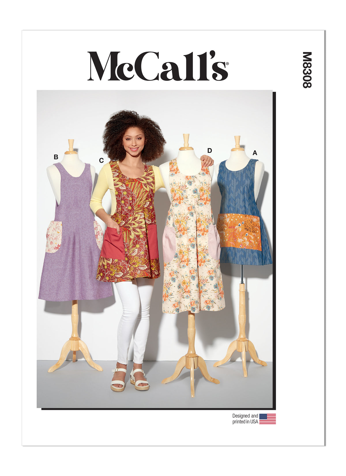 McCall's M8308 sewing pattern envelope showing aprons in two views