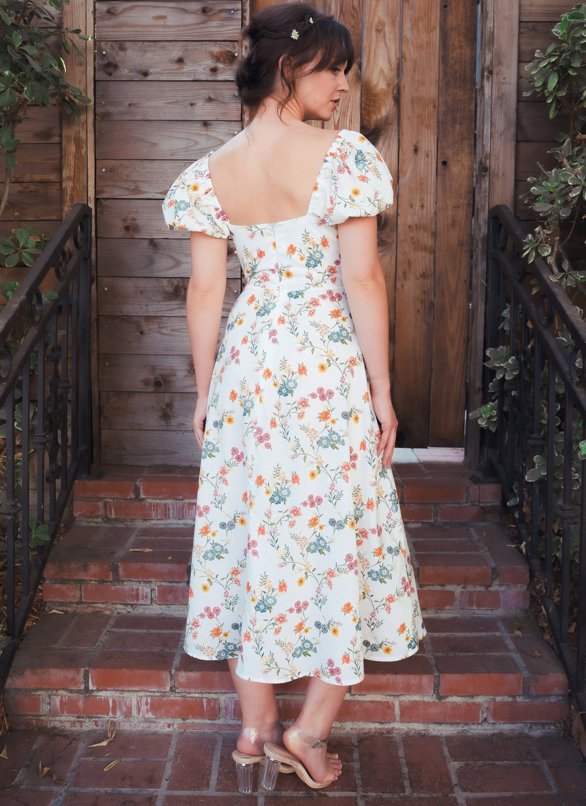McCall's M8359 sewing pattern envelope showing floral midi dress with puff sleeves