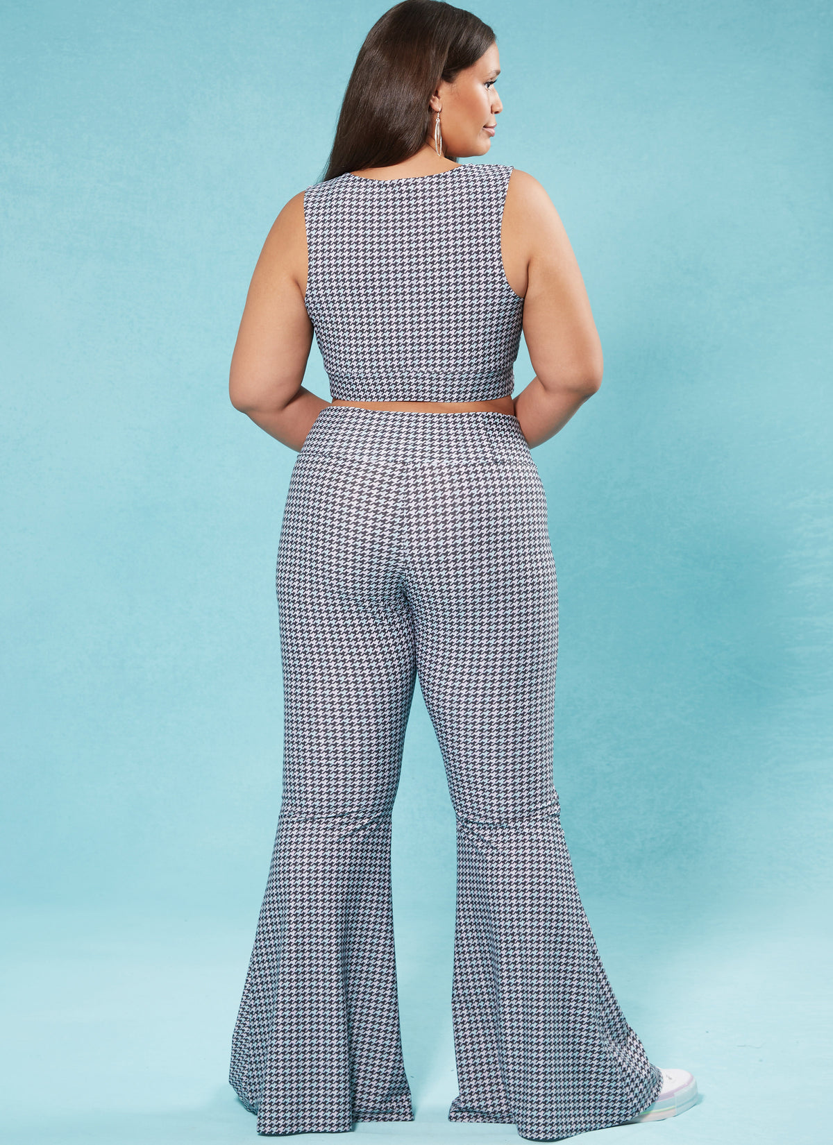 McCall's M8369 sewing pattern envelope showing athletic crop tops in two styles
