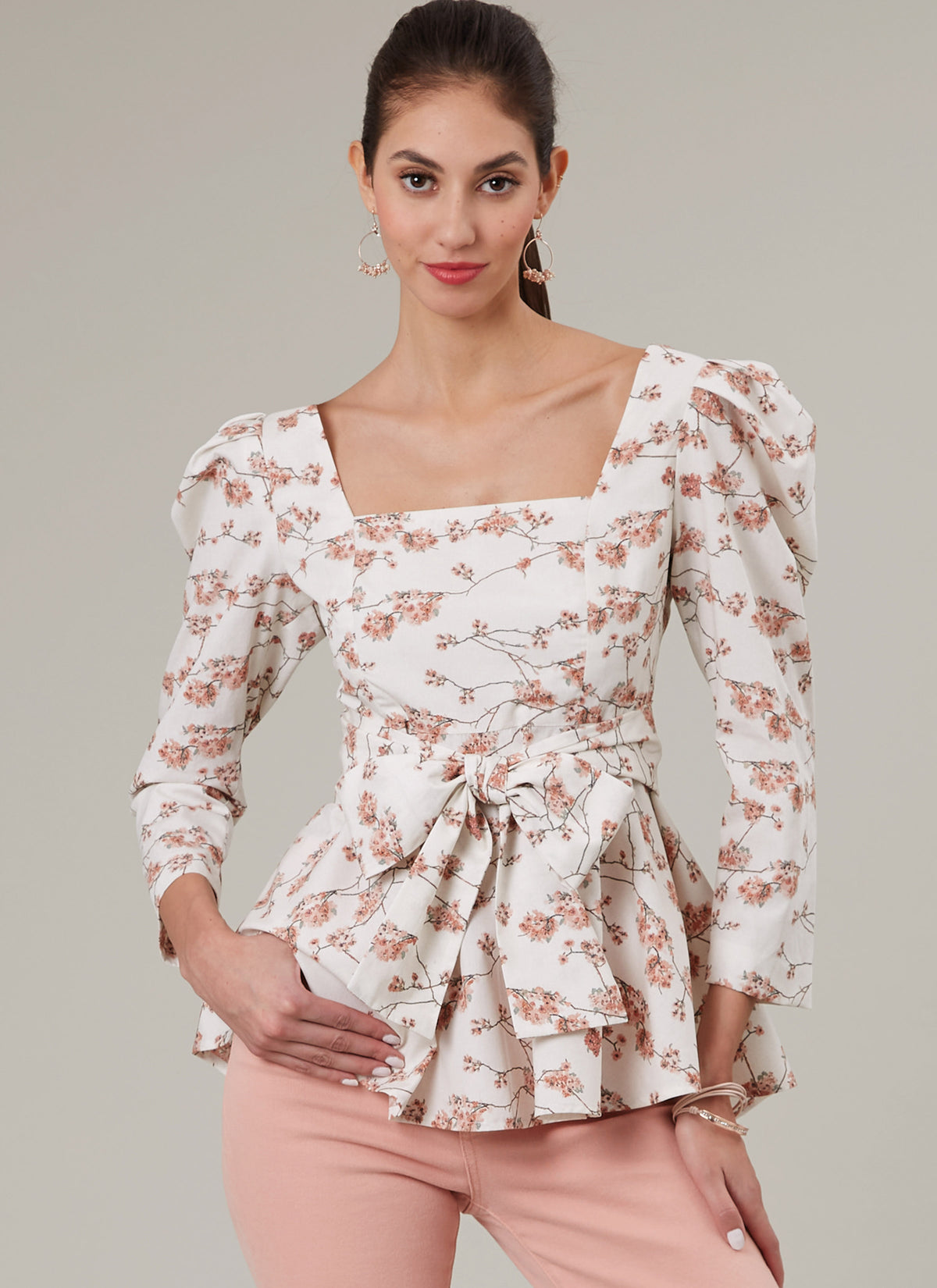 McCall's M8388 sewing pattern envelope showing tops with sleeves or straps