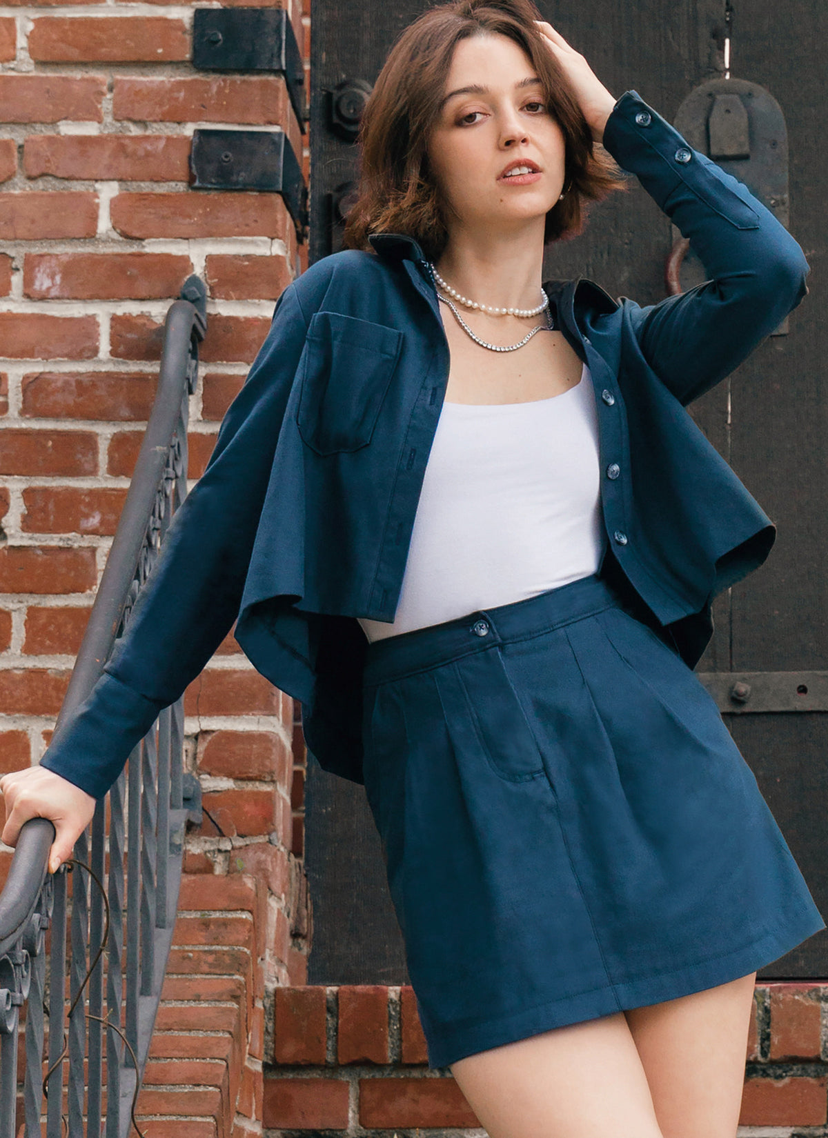 McCall's M8410 sewing pattern envelope showing cropped button-down shirt designs