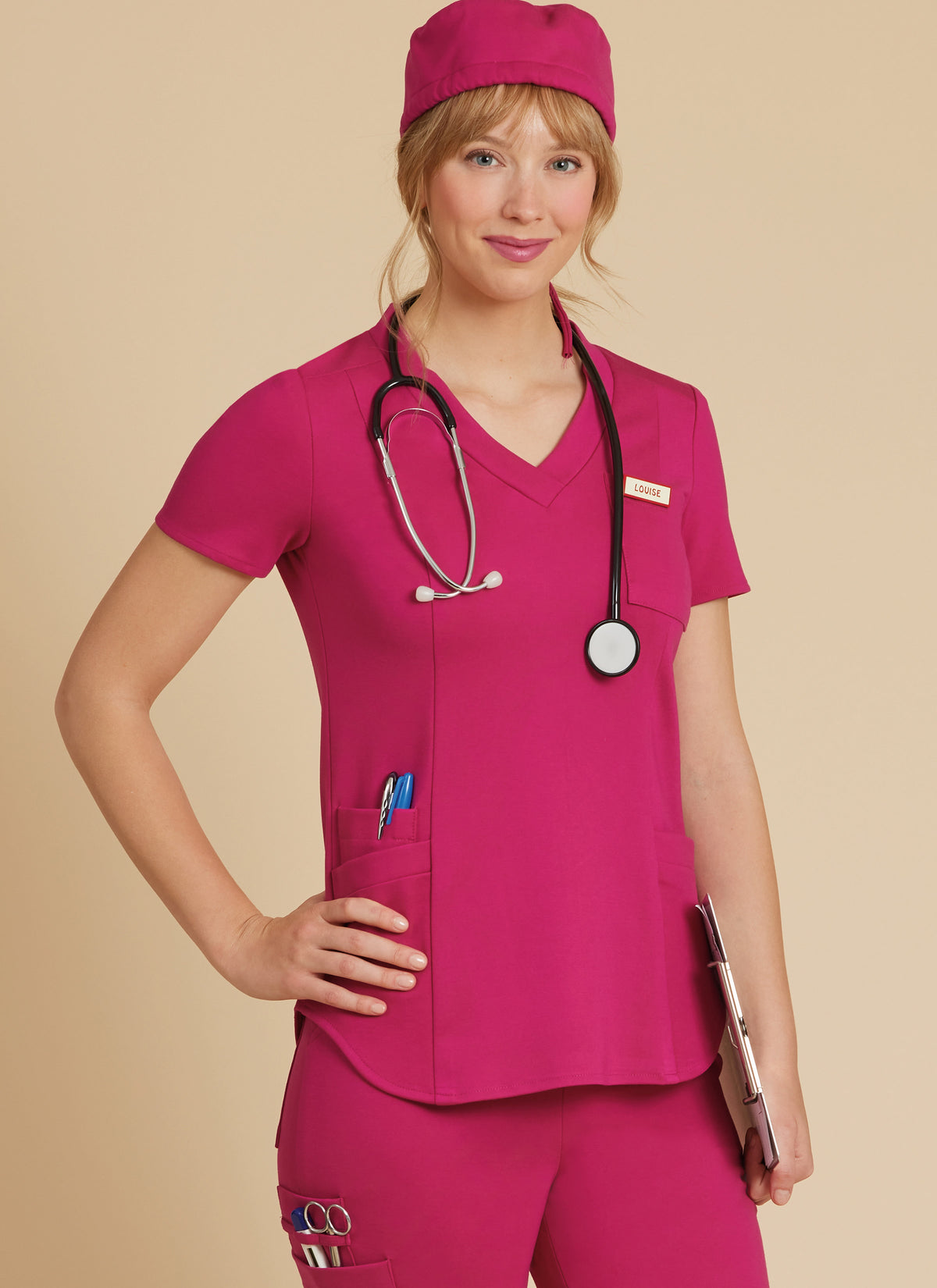 McCall's M8421 sewing pattern envelope showing scrub tops designs