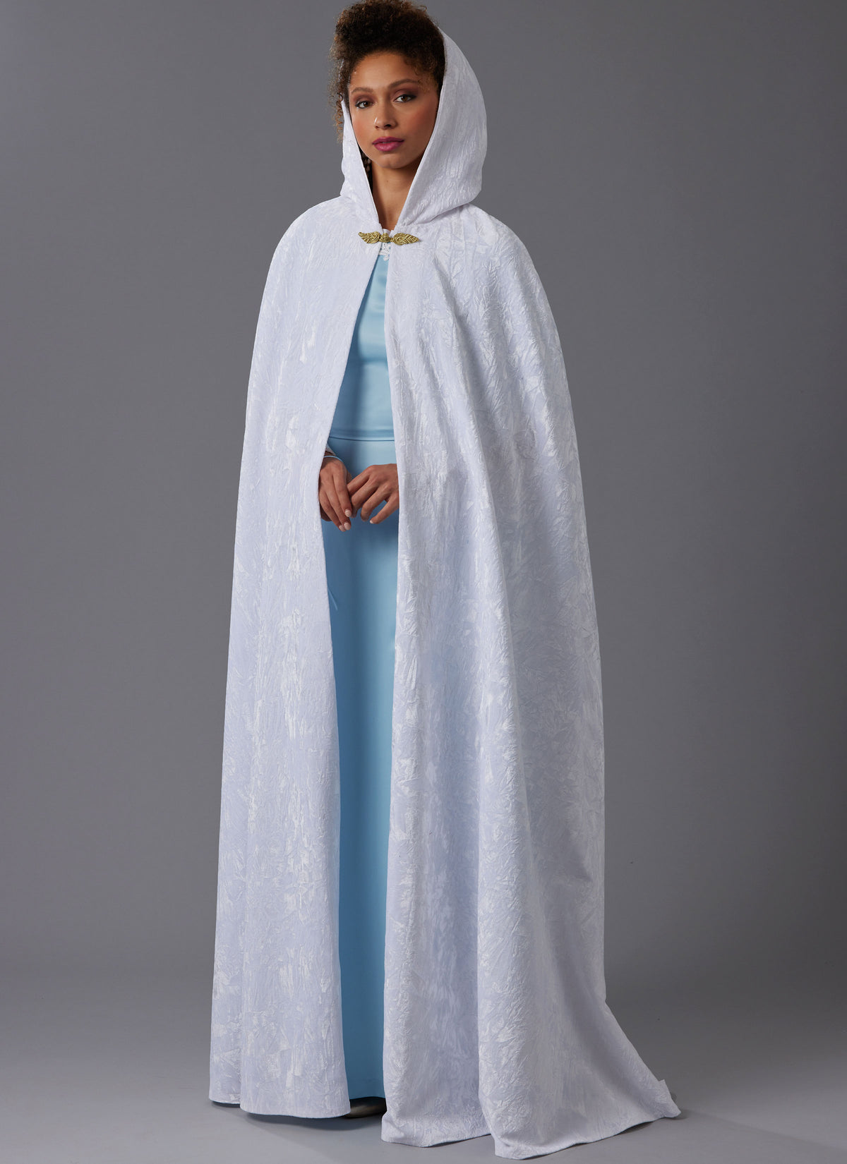 McCall's M8428 sewing pattern envelope showing unlined cape designs