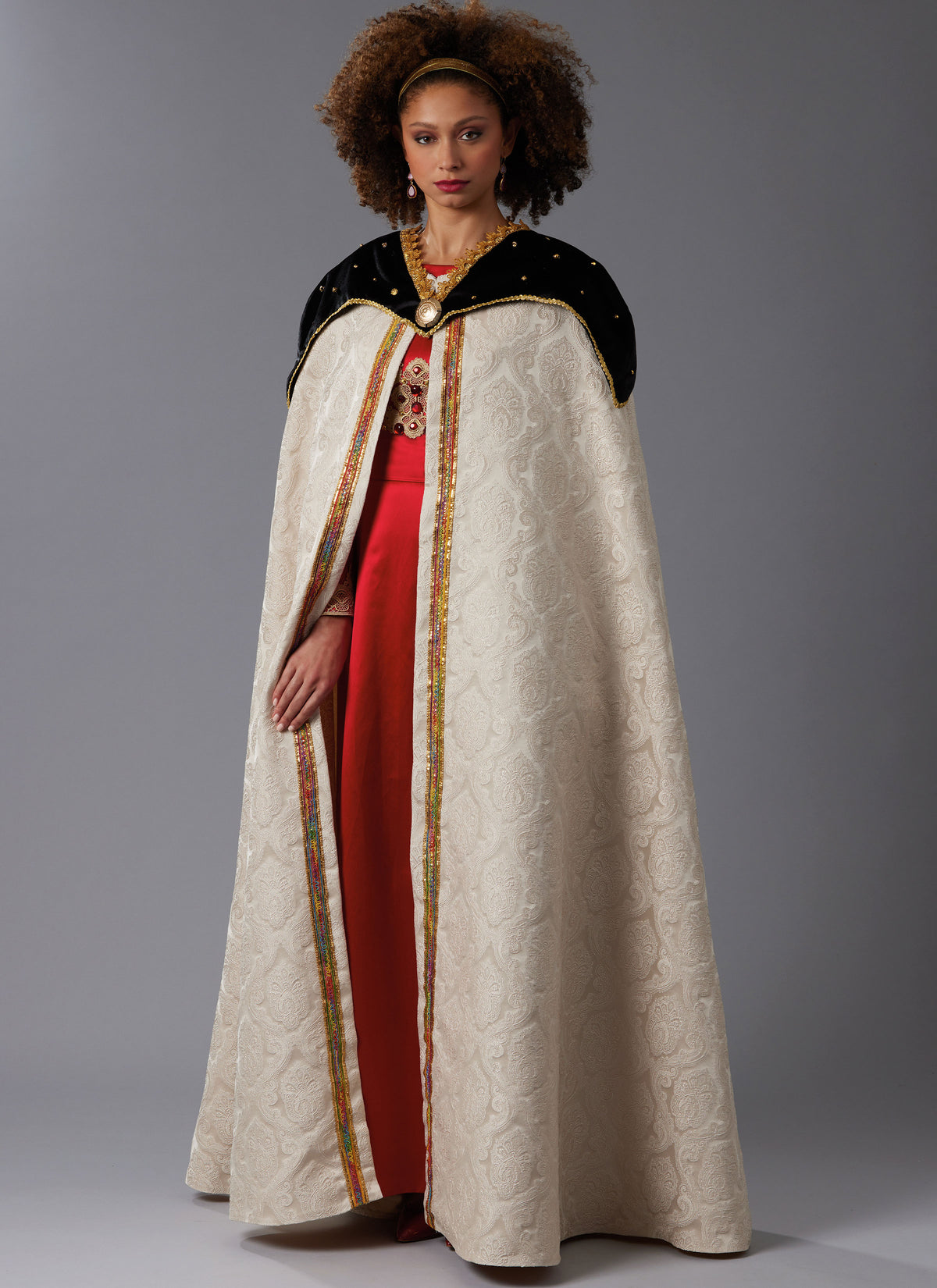 McCall's M8428 sewing pattern envelope showing unlined cape designs