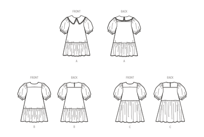 McCall's M8444 sewing pattern envelope showing girls' puff sleeve dress designs