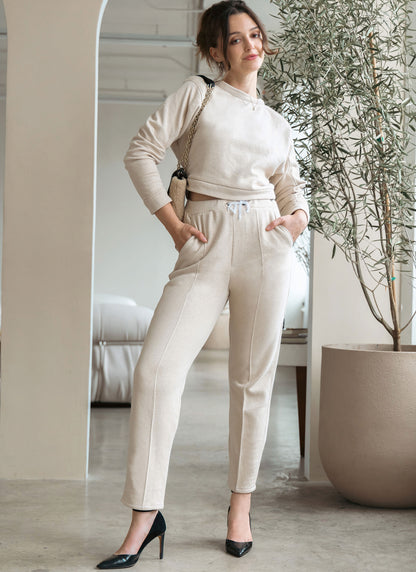 McCall's M8447 sewing pattern envelope showing women's oversized sweats designs