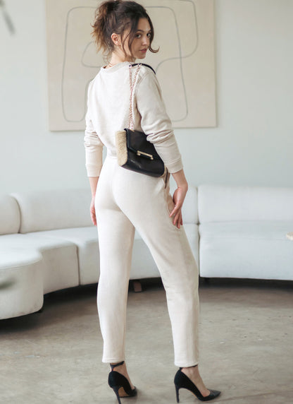 McCall's M8447 sewing pattern envelope showing women's oversized sweats designs