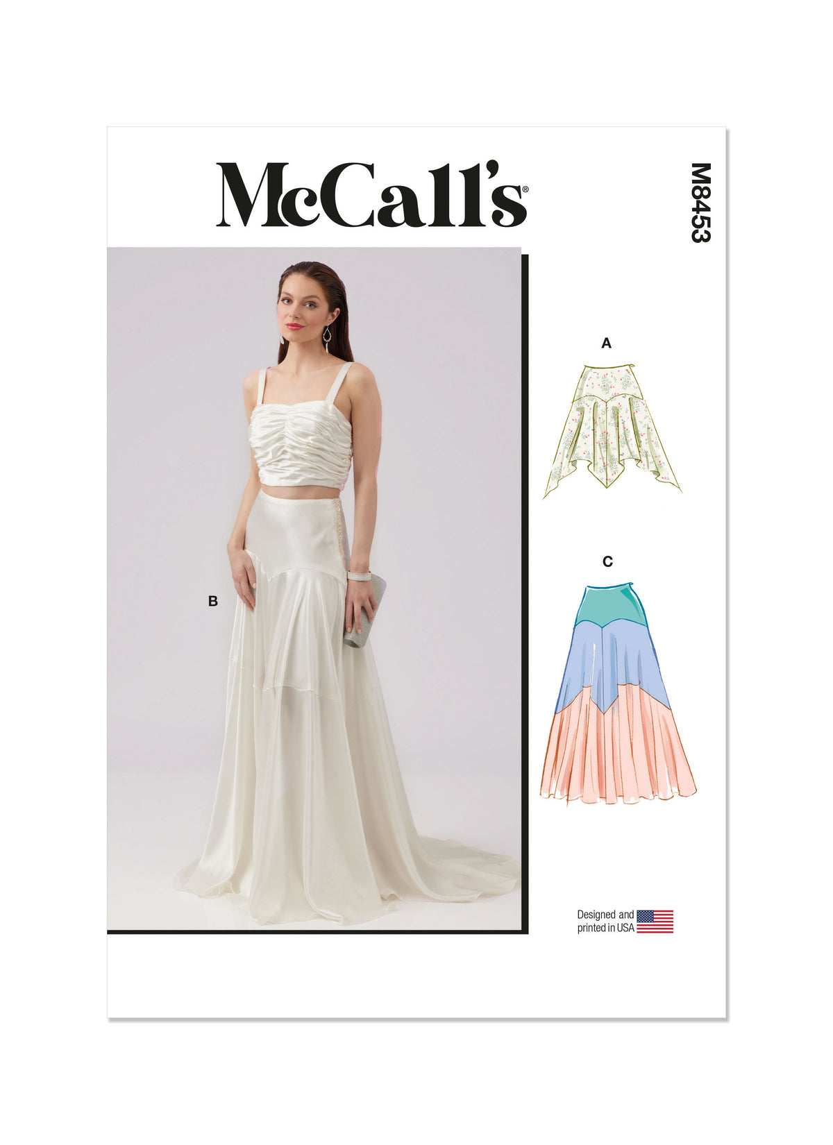 McCall's M8453 sewing pattern envelope showing women's bias yoke skirt designs