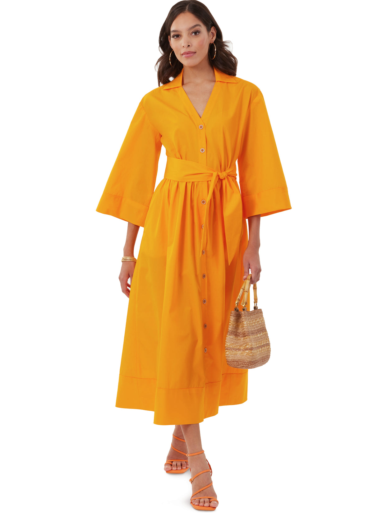 McCall's M8477 sewing pattern envelope showing misses' dropped shoulder shirtdress designs