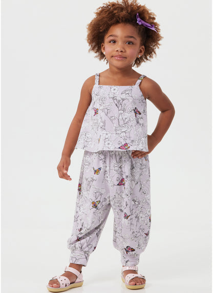 McCall's M8488 sewing pattern envelope showing toddler tops, shorts & trousers designs