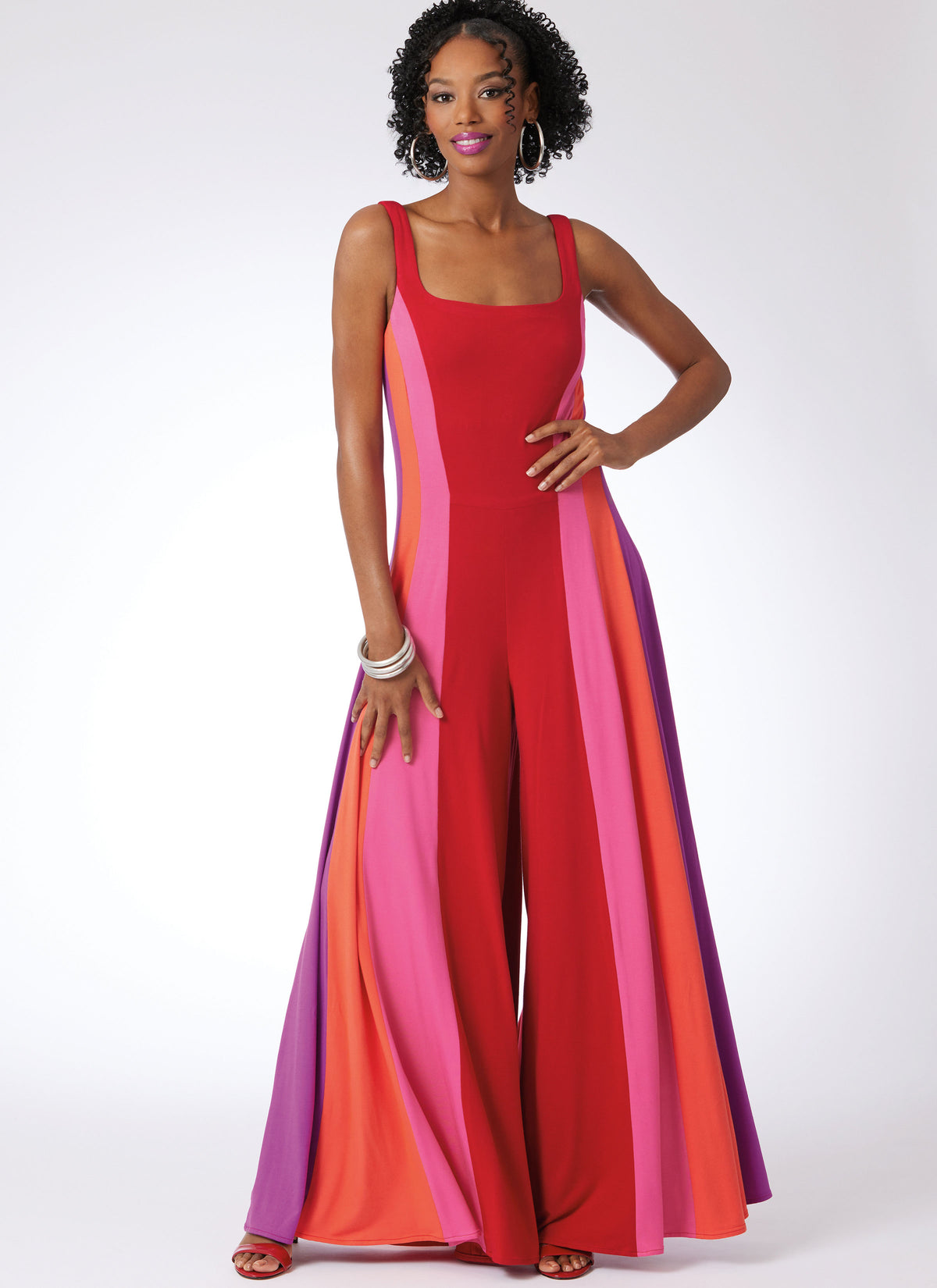 McCall's M8512 sewing pattern envelope showing floor length jumpsuits and a dress