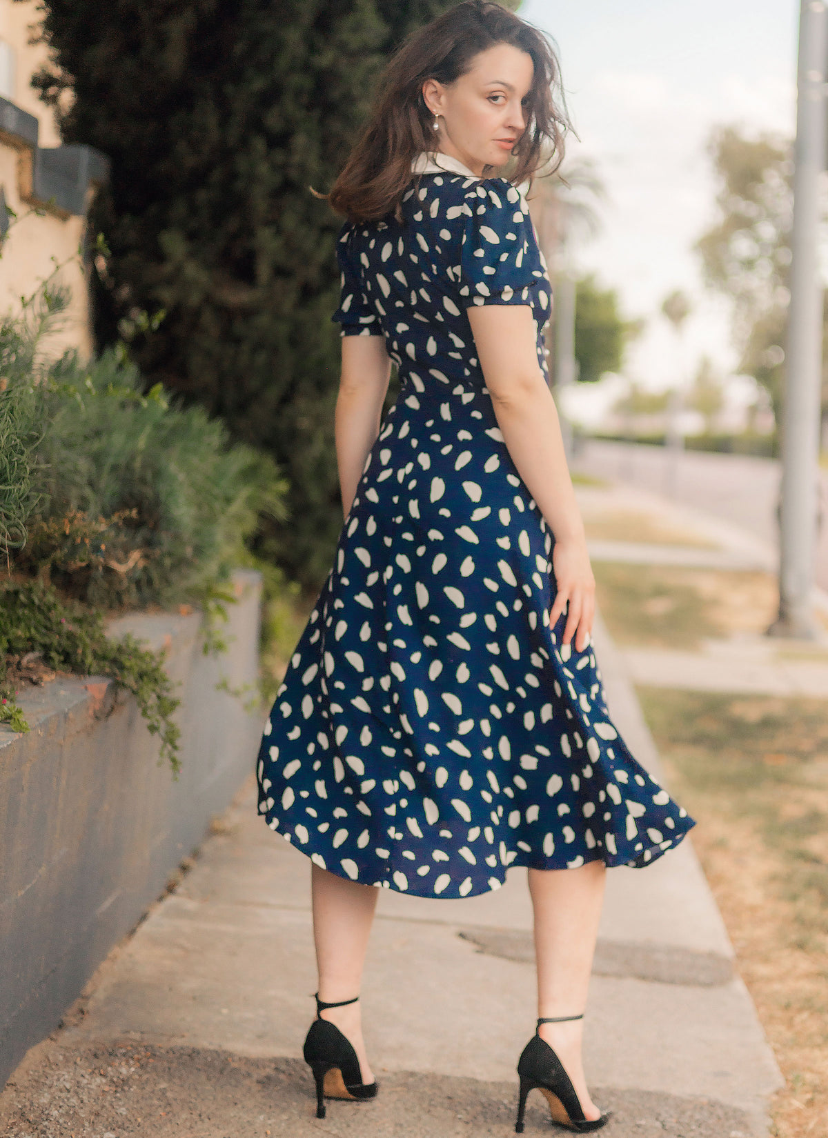 McCall's M8525 sewing pattern envelope showing mid-calf dress