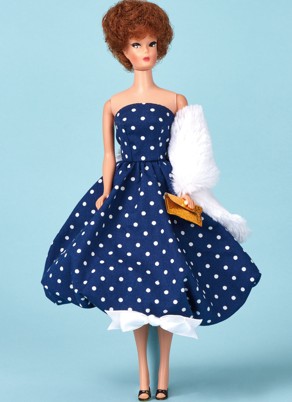 McCall's M8544 sewing pattern envelope showing fashion doll clothes