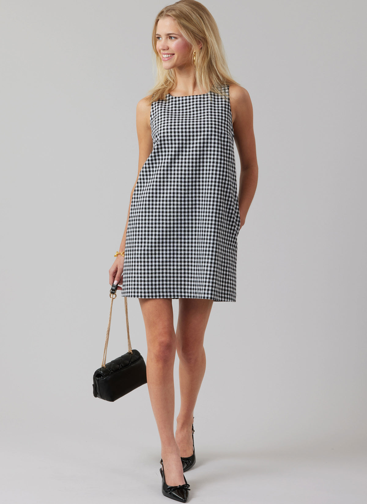McCall's M8562 pattern envelope showing a sleeveless top and dress with square neckline