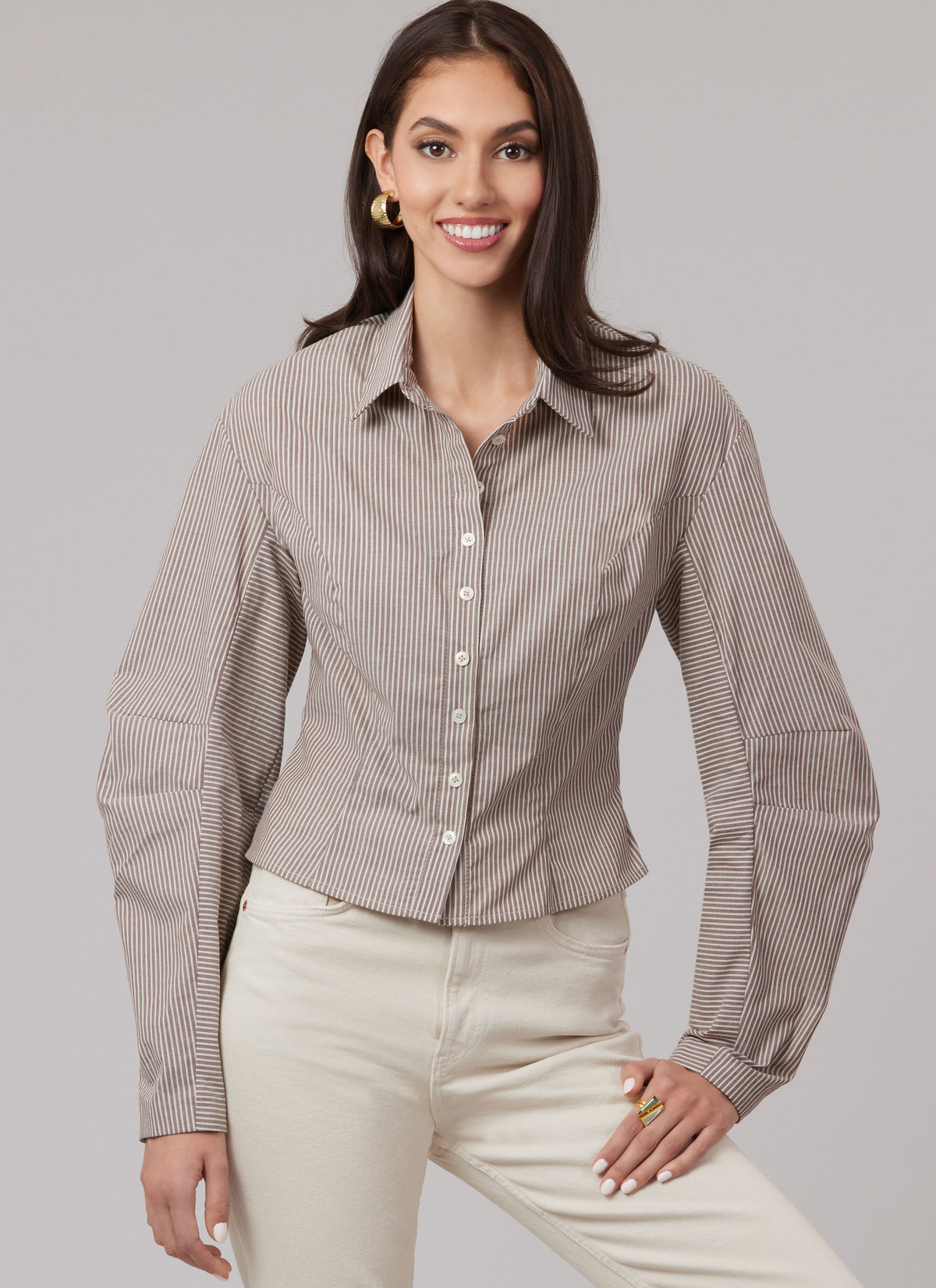 McCall's M8580 sewing pattern envelope showing fitted collared shirts designs