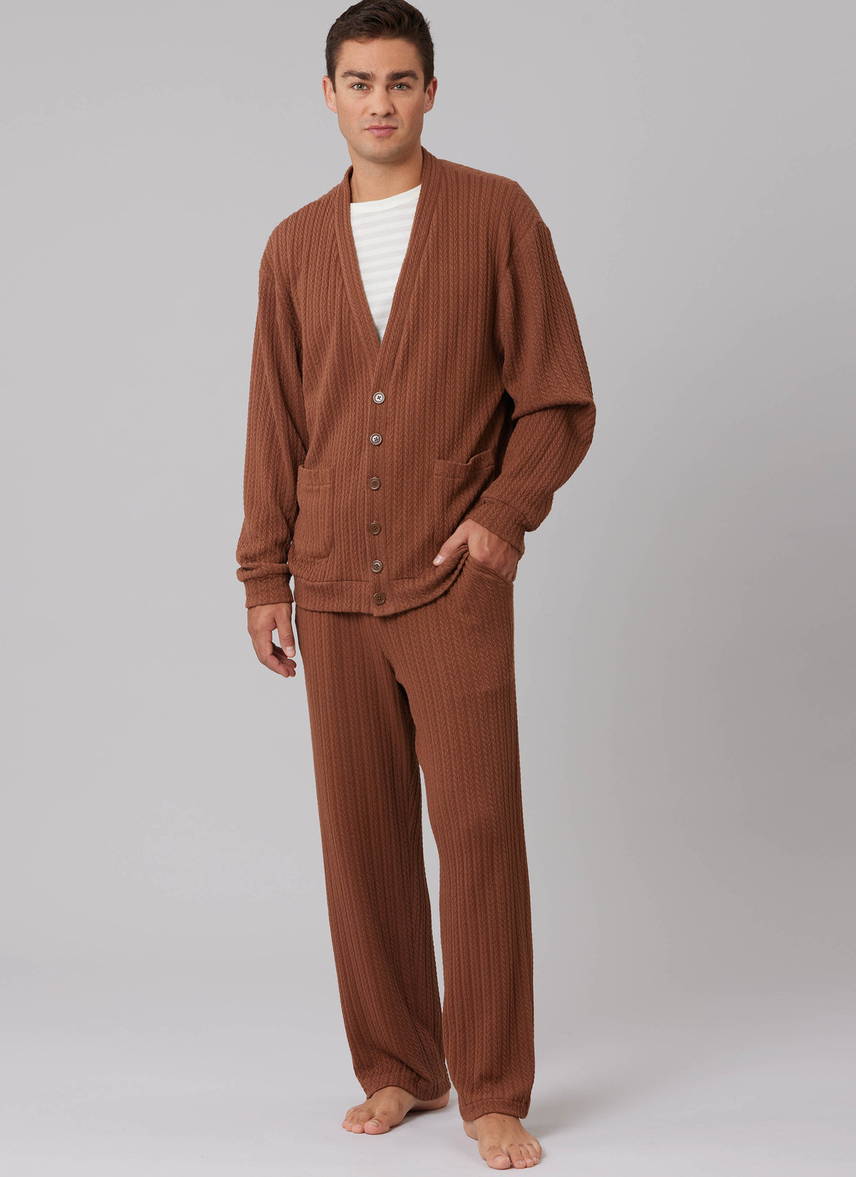 McCall's M8637 sewing pattern envelope showing a V-neck waistcoat and cardigan