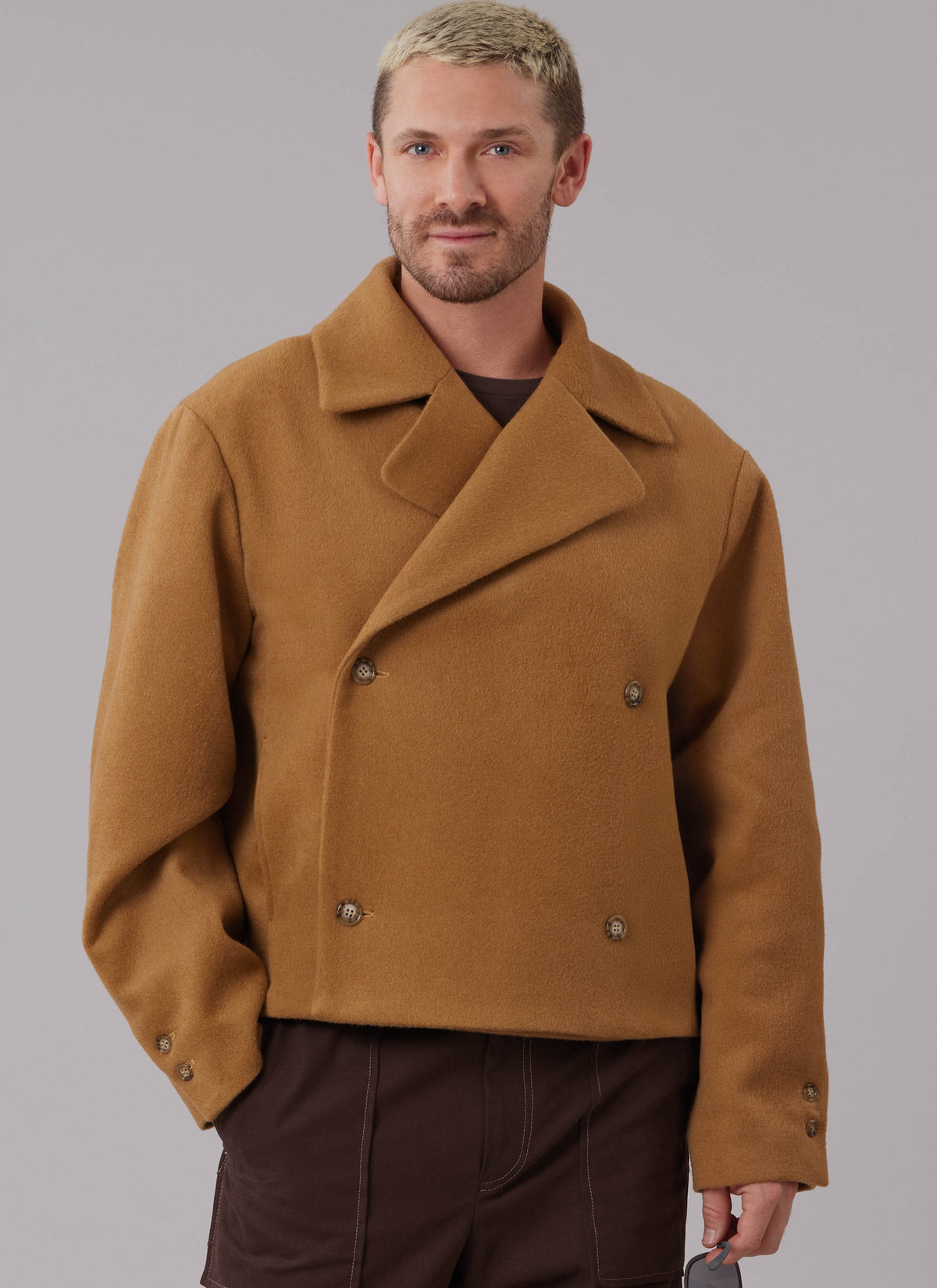 McCall's M8638 sewing pattern envelope showing a loose-fitting, lined, double-breasted jacket