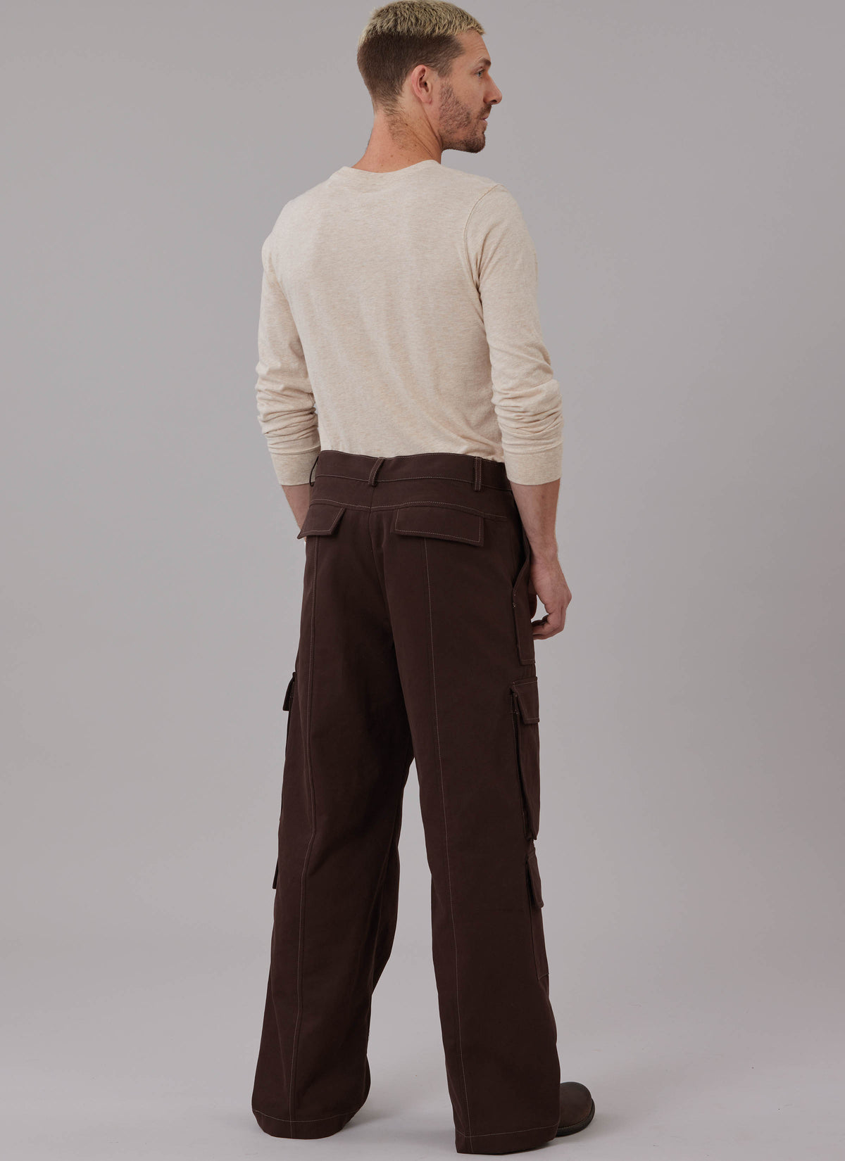 McCall's M8639 sewing pattern envelope showing loose-fitting trousers that sit 1in below the waist