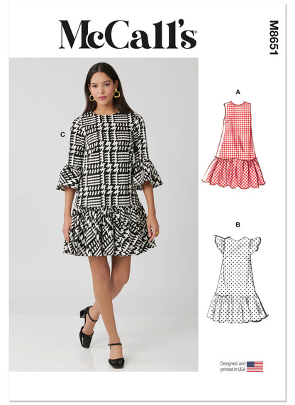 McCall's M8651 sewing pattern envelope showing drop-waist mini dress designs