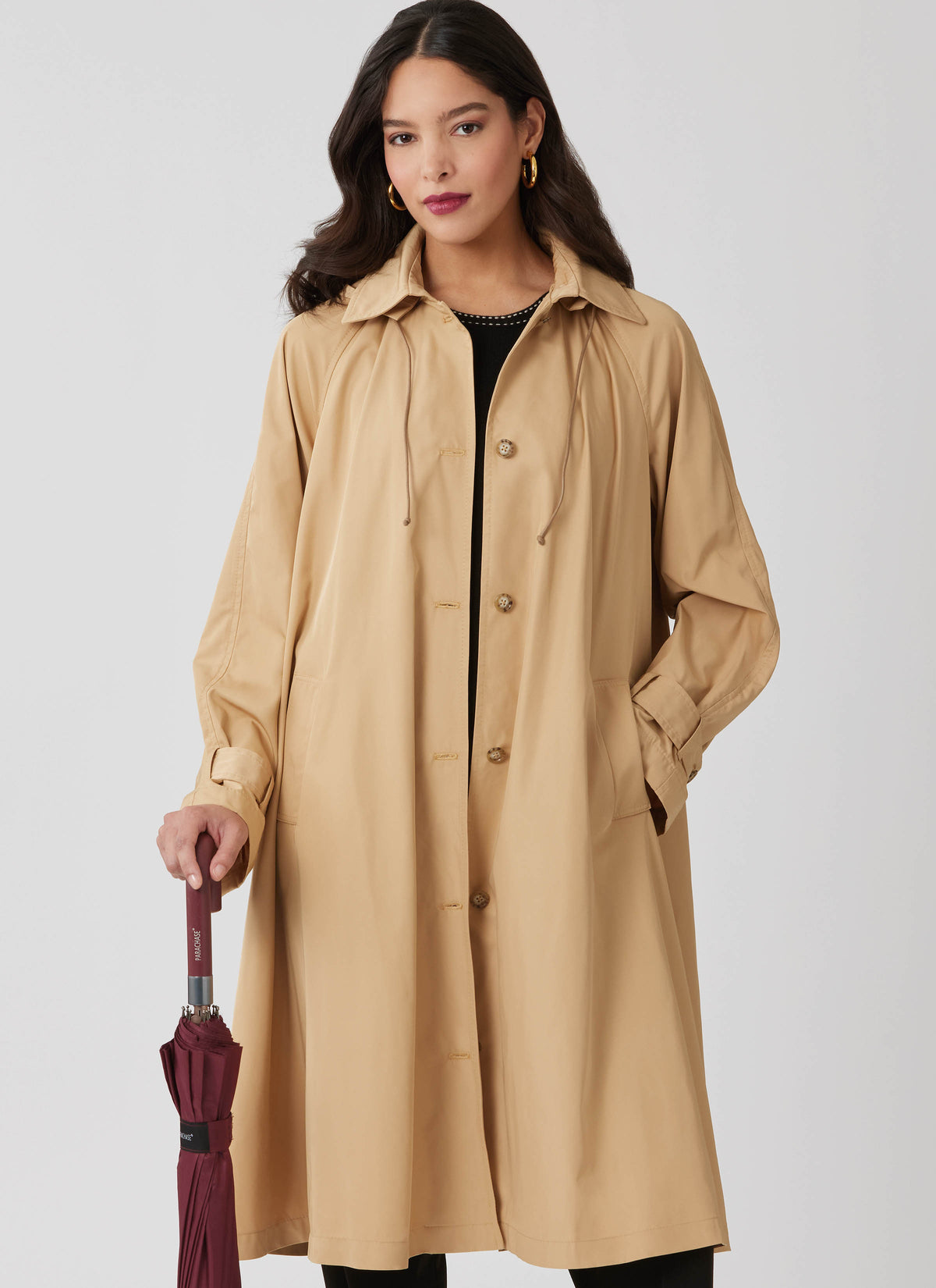 McCall's M8655 sewing pattern envelope showing swing trench coat designs