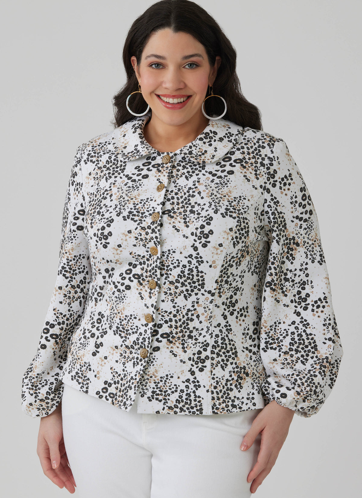 McCall's M8657 sewing pattern envelope showing peter pan collar knit top designs