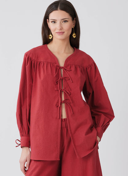 McCall's M8663 sewing pattern envelope showing relaxed sleepwear shirt designs