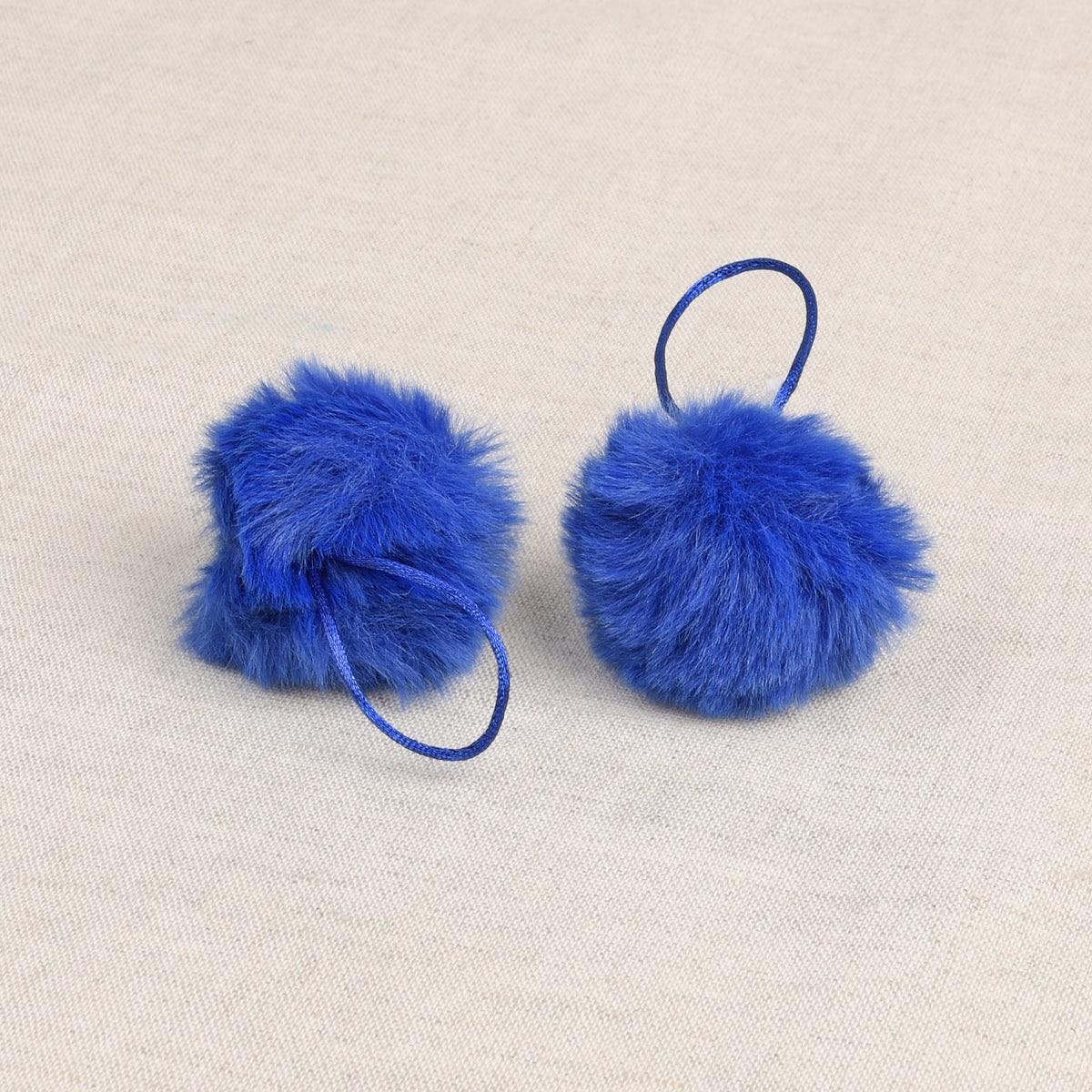 Neon Blue faux fur pom pom with loop