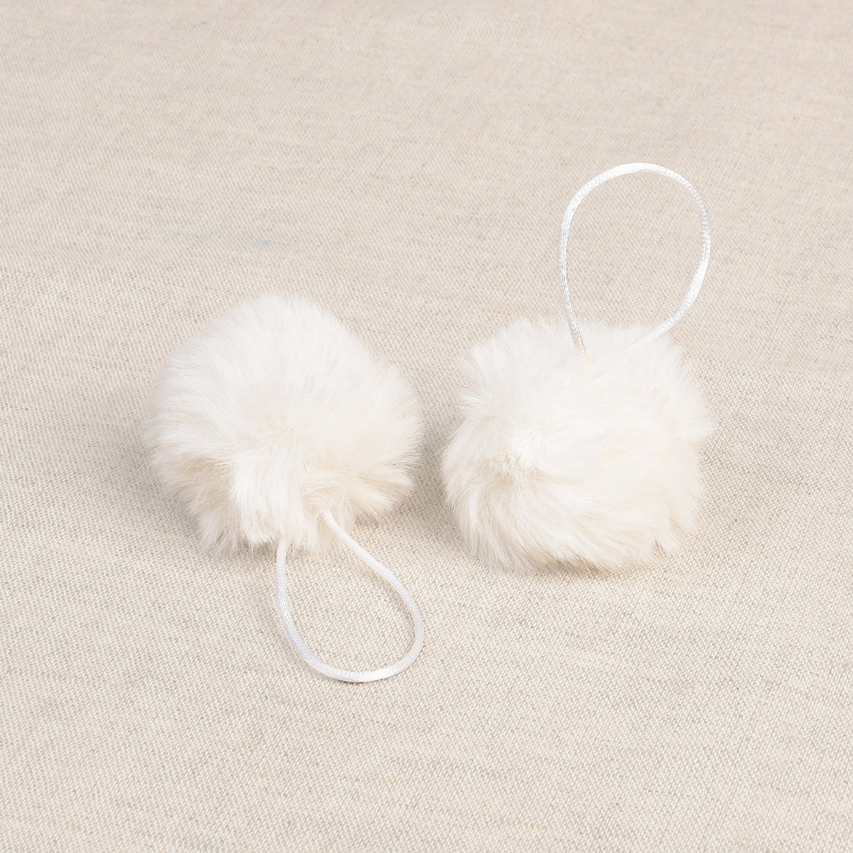 Off White faux fur pom pom with loop