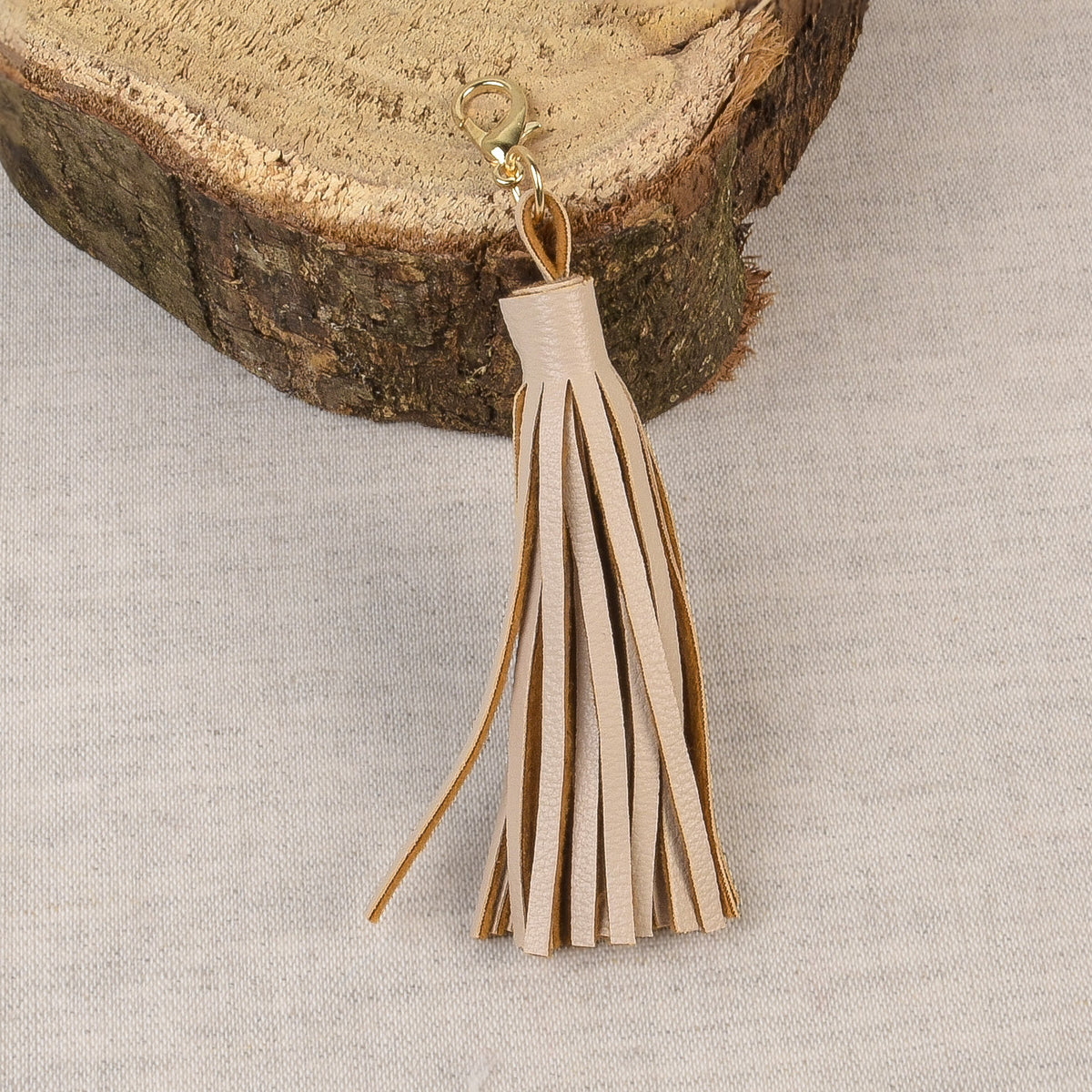 Stone Beige tassel with a fastener at the top