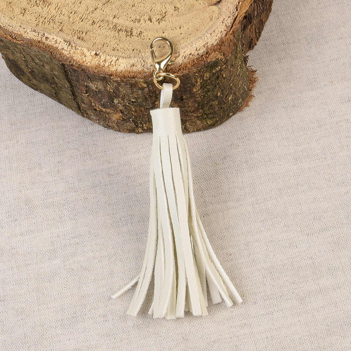 Ivory tassel with fastener