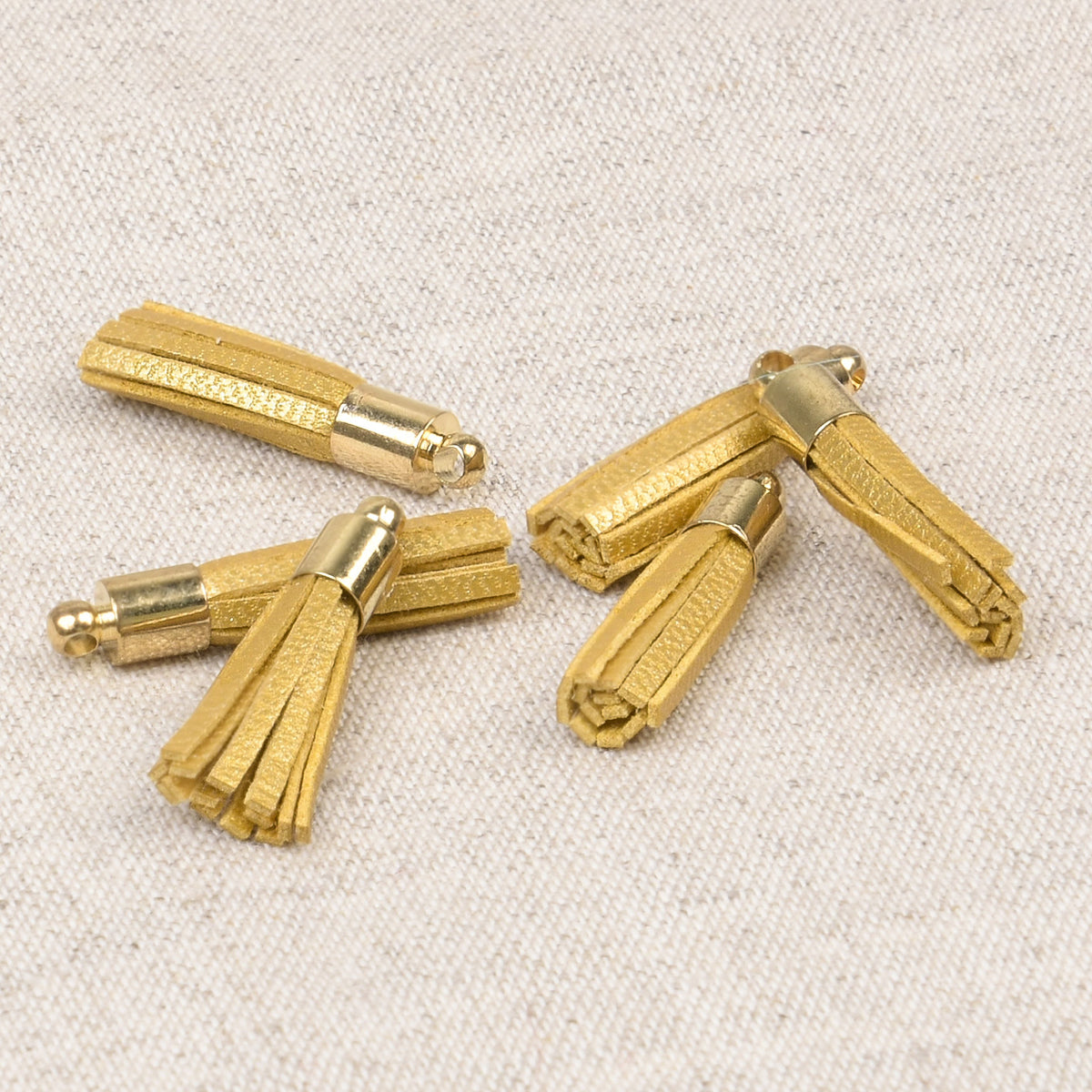 Small gold mini tassel