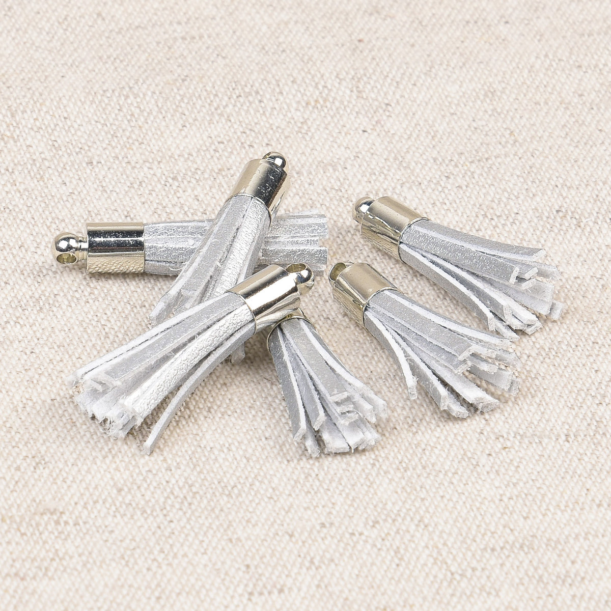 Small silver mini tassel
