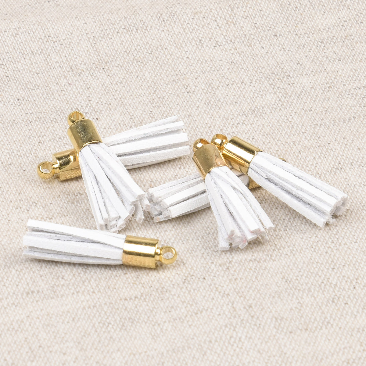Small white mini tassel