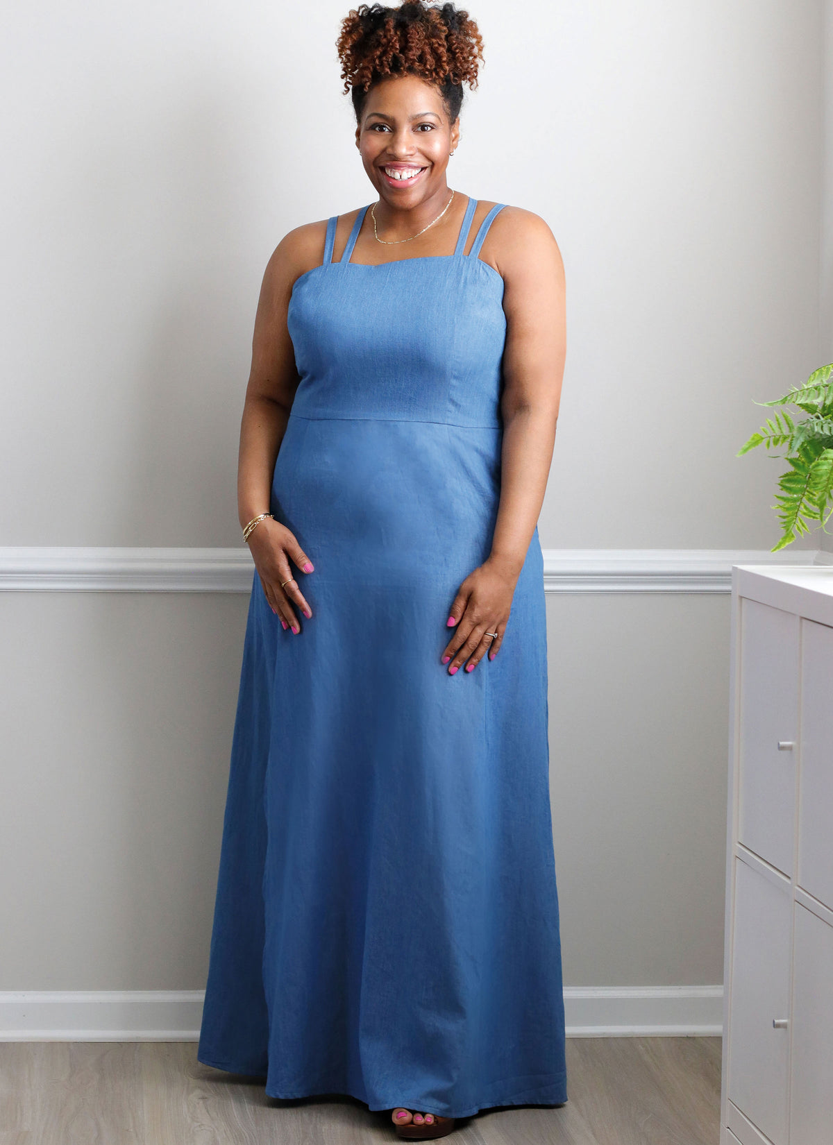 McCall's ME2040 sewing pattern envelope showing the strappy high back dress designs