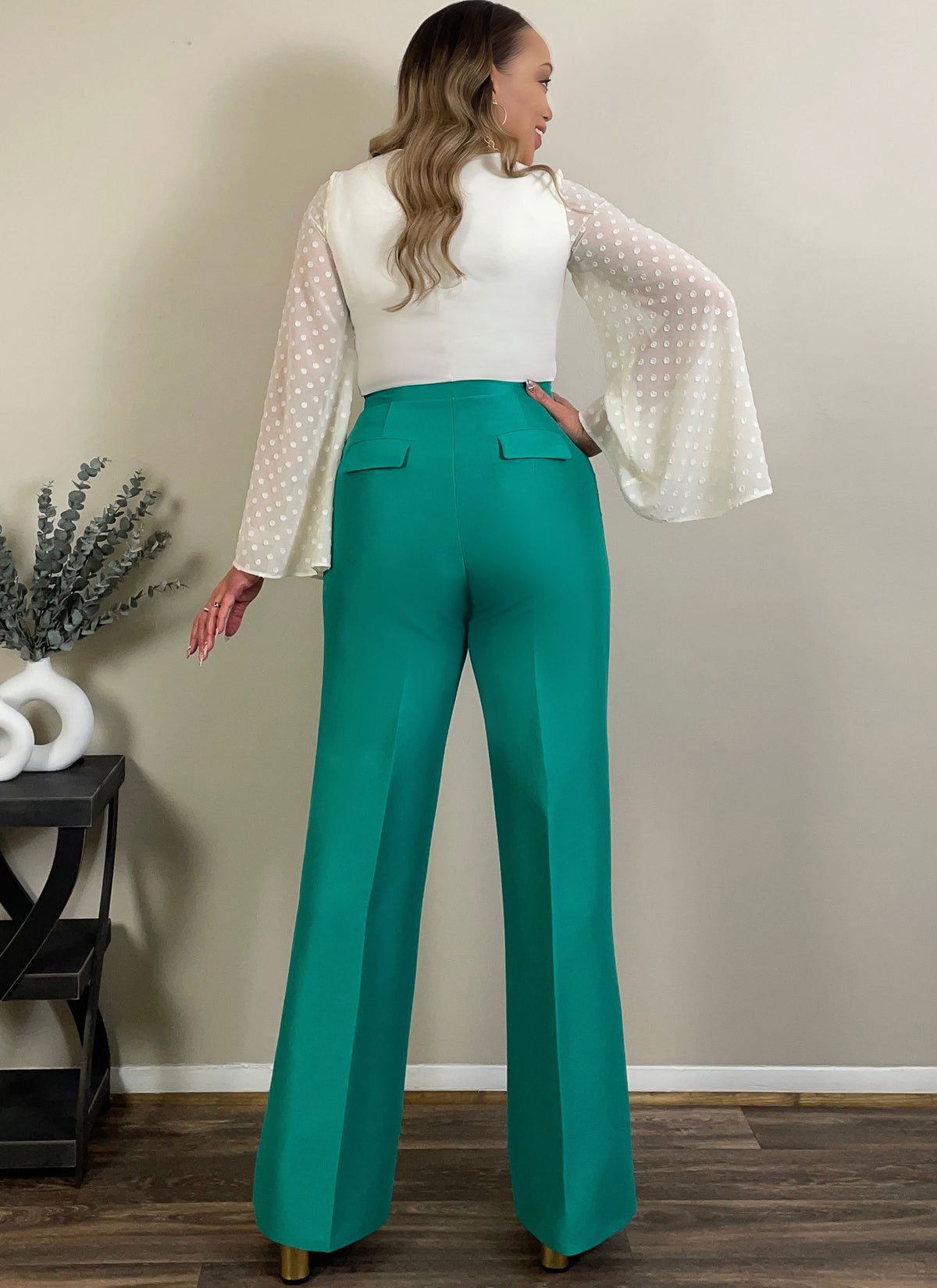 McCall's ME2043 sewing pattern envelope showing the deep v-neck bodysuit designs