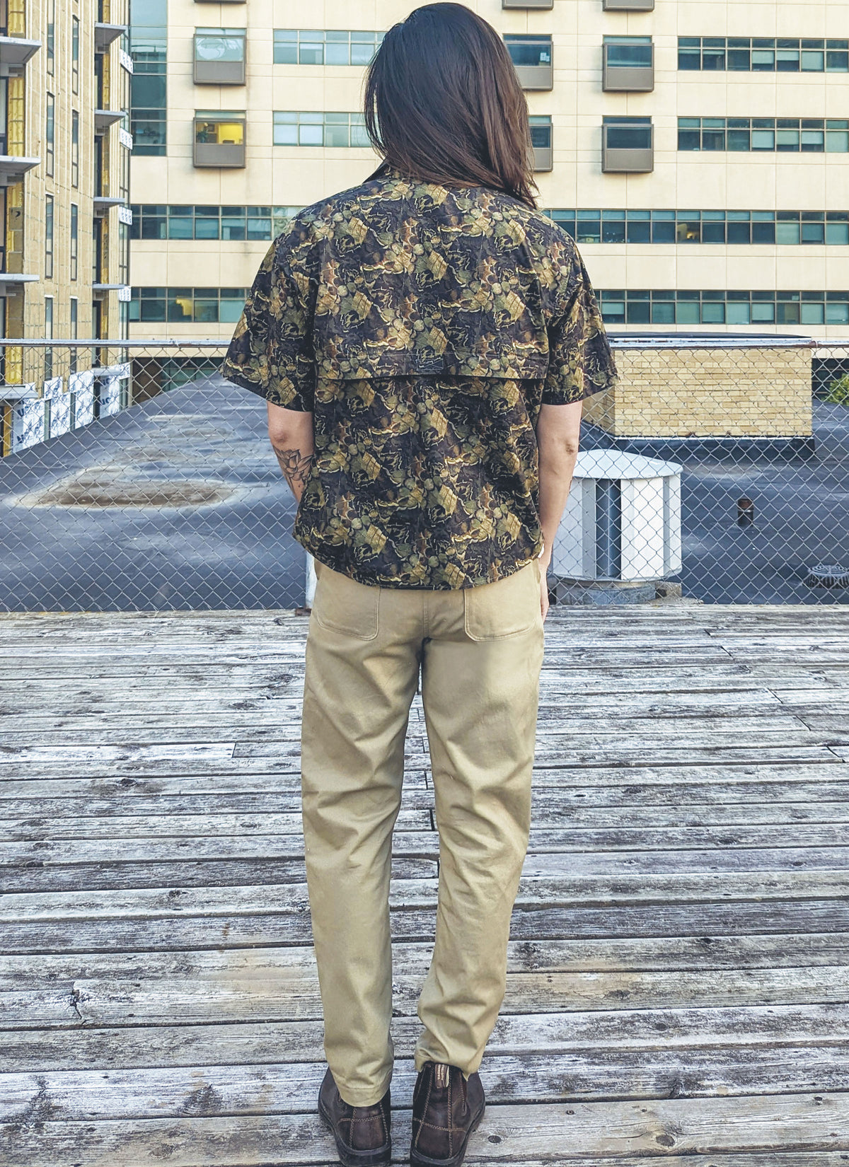 McCall's ME2056 sewing pattern envelope showing the men's oversized short sleeve shirt designs