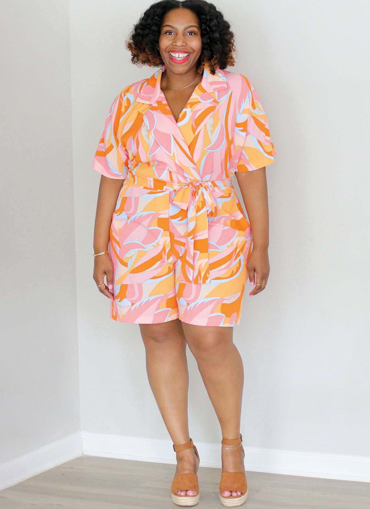McCall's ME2063 sewing pattern envelope showing the notched collar romper and jumpsuit designs