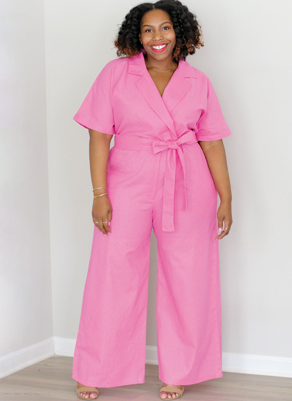 McCall's ME2063 sewing pattern envelope showing the notched collar romper and jumpsuit designs