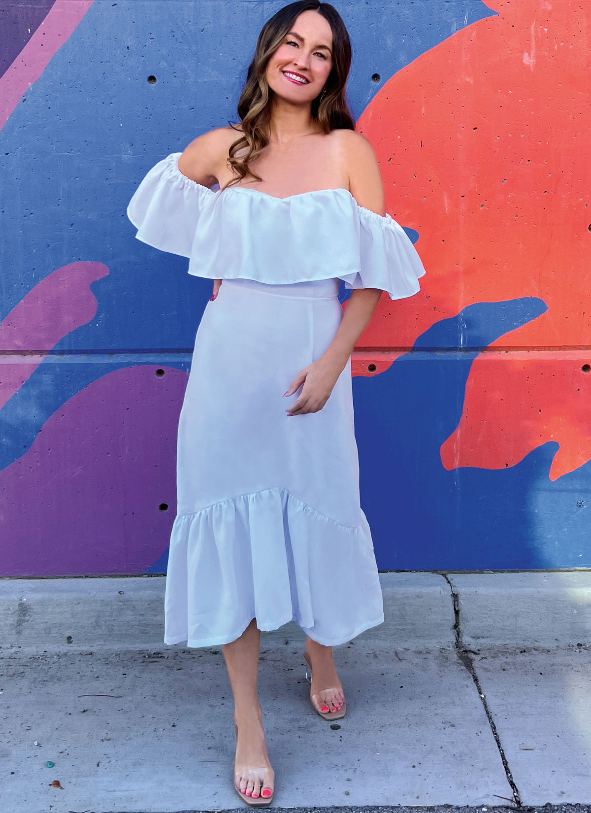 McCall's ME2067 sewing pattern envelope showing the off the shoulder ruffle dress designs