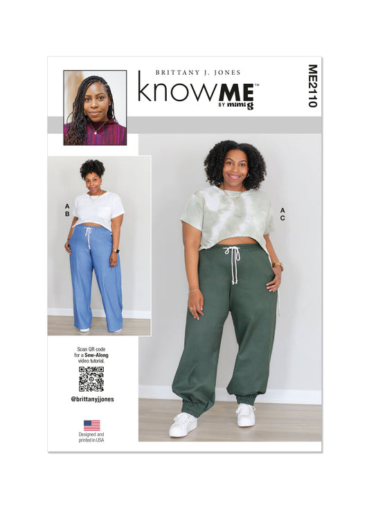McCall's ME2110 sewing pattern envelope showing women's plus size loose fit t-shirt top designs