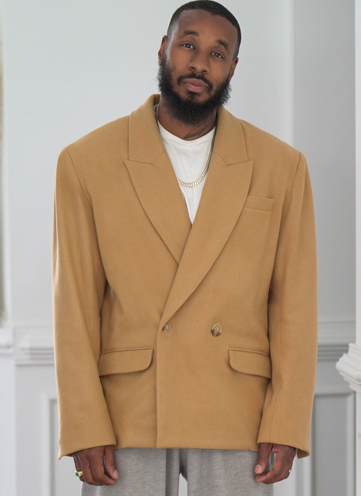 McCall's ME2118 sewing pattern envelope showing men's oversized double-breasted jacket designs