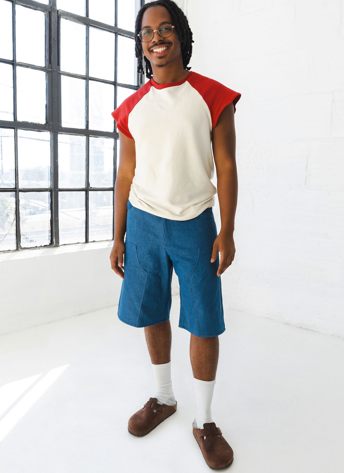 McCall's ME2121 sewing pattern envelope showing men's raglan t-shirt designs