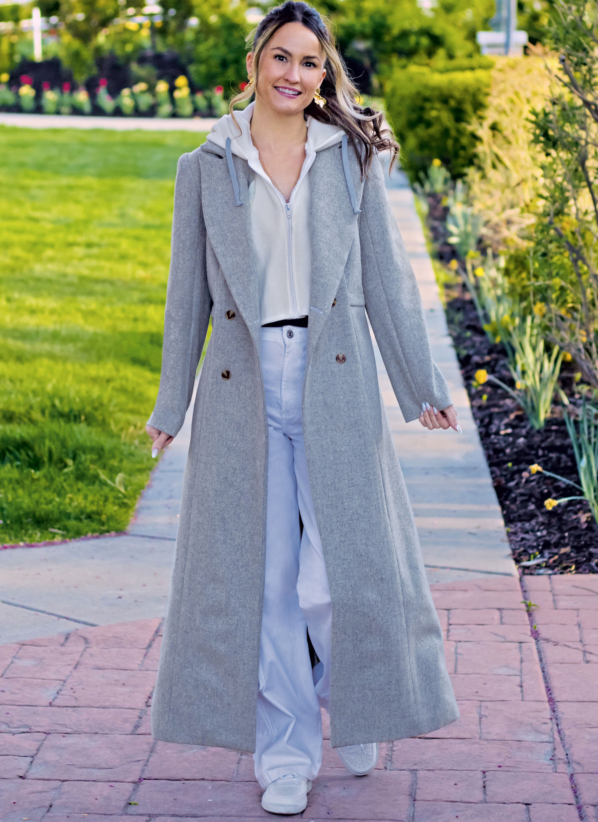 McCall's ME2139 sewing pattern envelope showing women's double-breasted lined coat designs