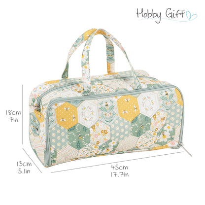 Cotton knitting bag in a patchwork bee print with double handles