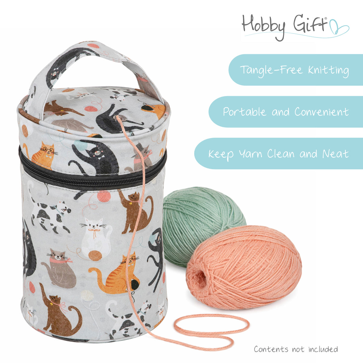 Fabric wool holder with a cat print, carry handle and yarn eyelet on top