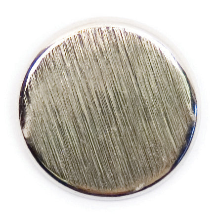 Round button with brushed silver-effect finish