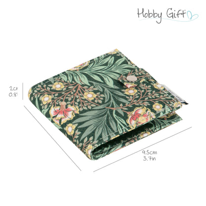 Green floral fabric needle case with scissors