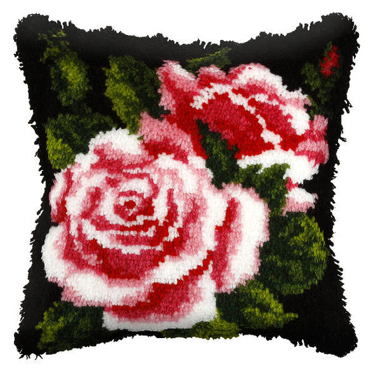 Finished latch hook cushion with pink rose design